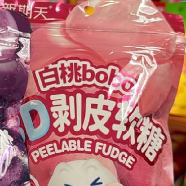 Pink bag of bobo 3D Peelable Fudge in white peach flavor, imported from China