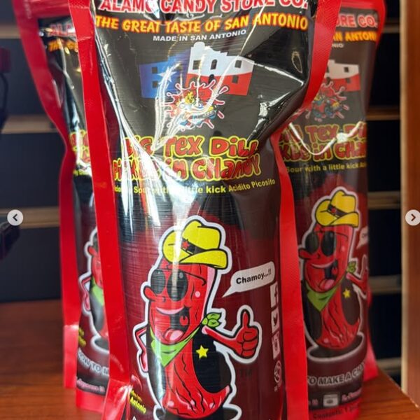 Alamo Chamoy Chango candy kit in a black bag with a red chili mascot, made in San Antonio, Texas